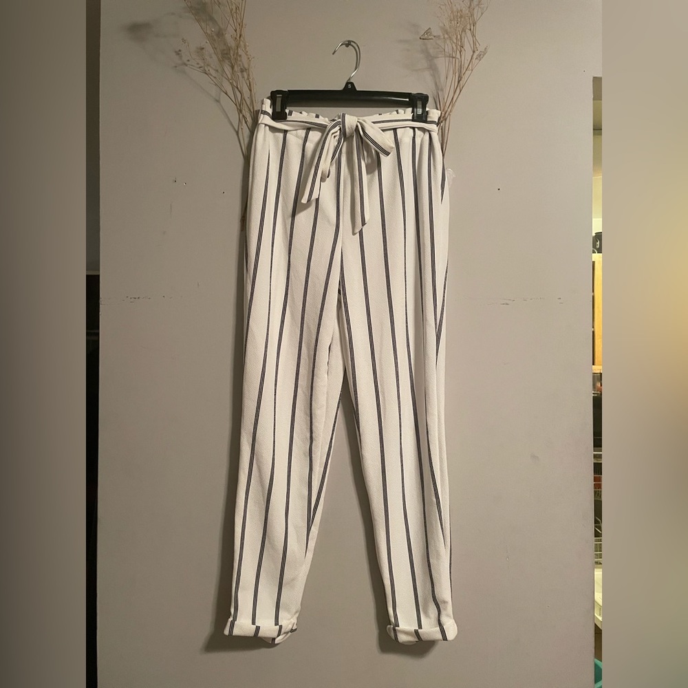 White and black vertical stripped trousers